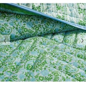 Pottery Barn brand new queen size reversible cotton quilt.